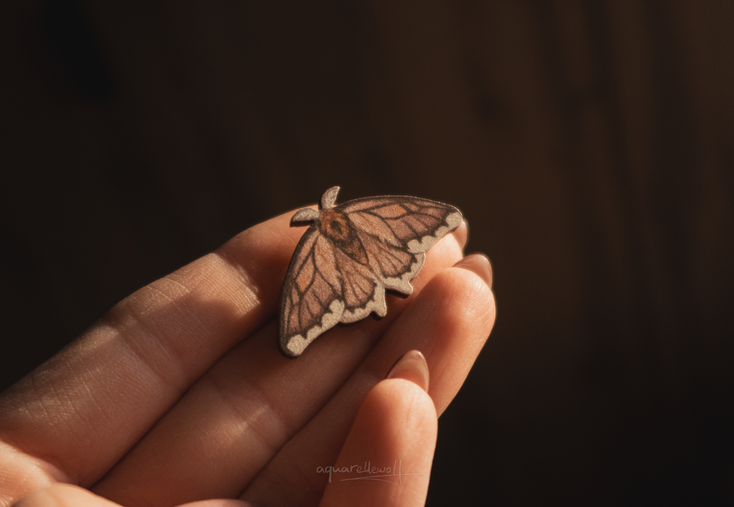 Значок дерев. “Мотылек”