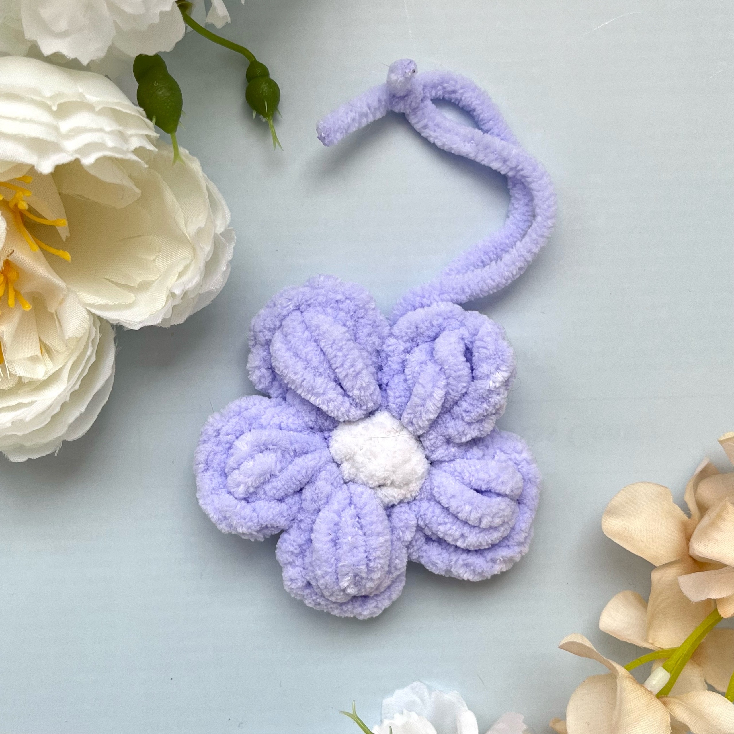 Обвес сиреневый цветок